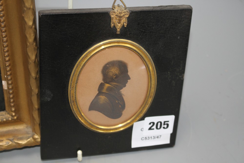 A Victorian oil on ivory miniature of a clergyman & a gilt silhouette of a gentleman by Field